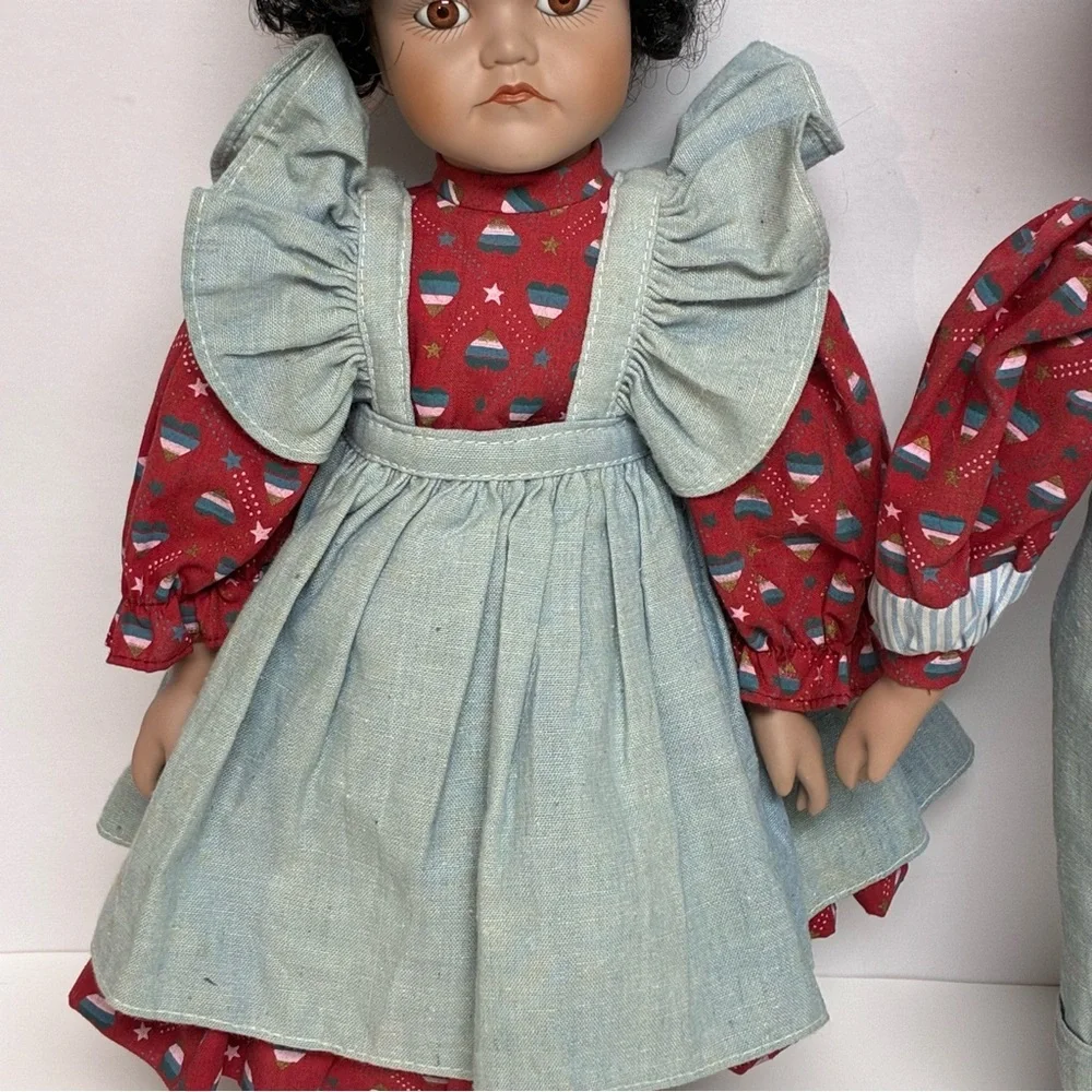Delton Product Corp. Porcelain Brown Boy Girl Dolls Stands Matching Outfits